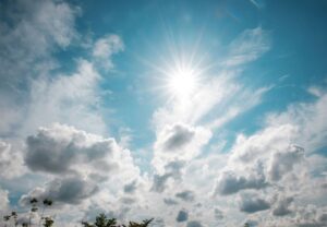 sun shining through the clouds